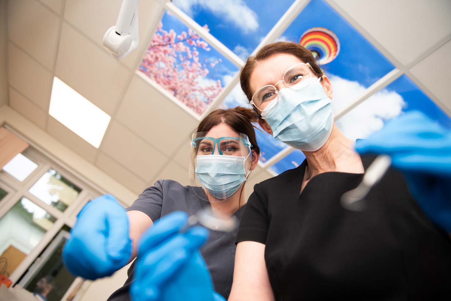 Dentist Christine Marzahn with dental nurse Natalia Morena during a dental hygiene appointment.