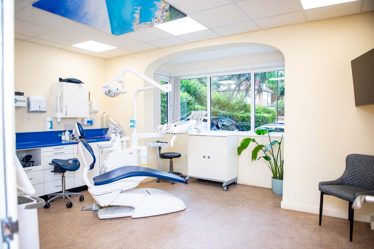 Treatment room showing calming ceiling display in dental surgery at Foxley Lane Dental in Purley to help reduce anxiety during treatment