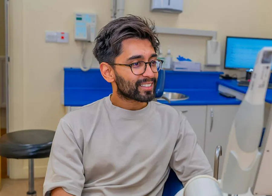 Patient smiling during an appointment in the surgery.