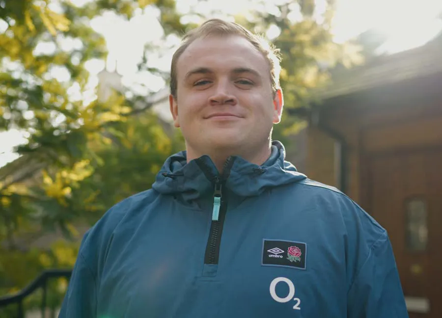 Patient Connor smiling outdoors after visiting his local Purley dentist