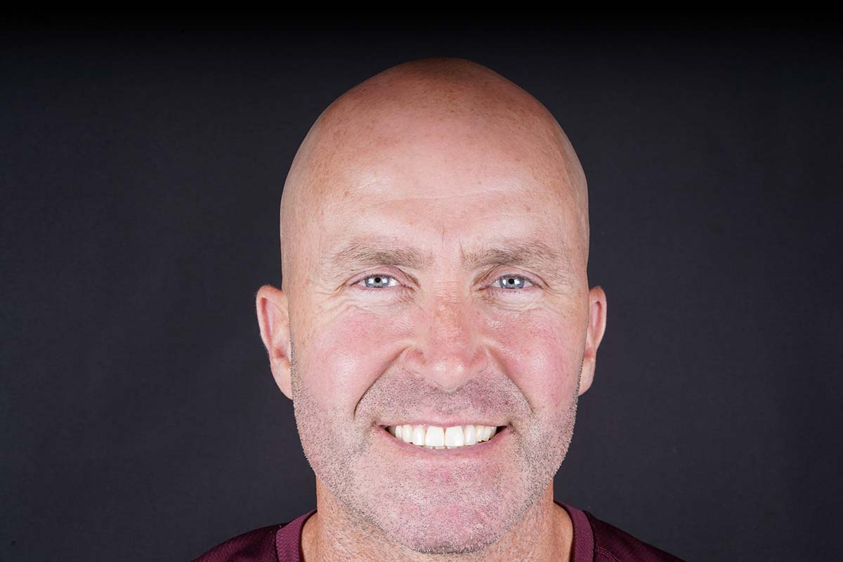 Smiling male patient at Foxley Lane Dental in Purley after receiving porcelain veneers. His teeth now appear straight, even, and natural-looking, with a confident smile that highlights the long-lasting results of cosmetic dentistry.