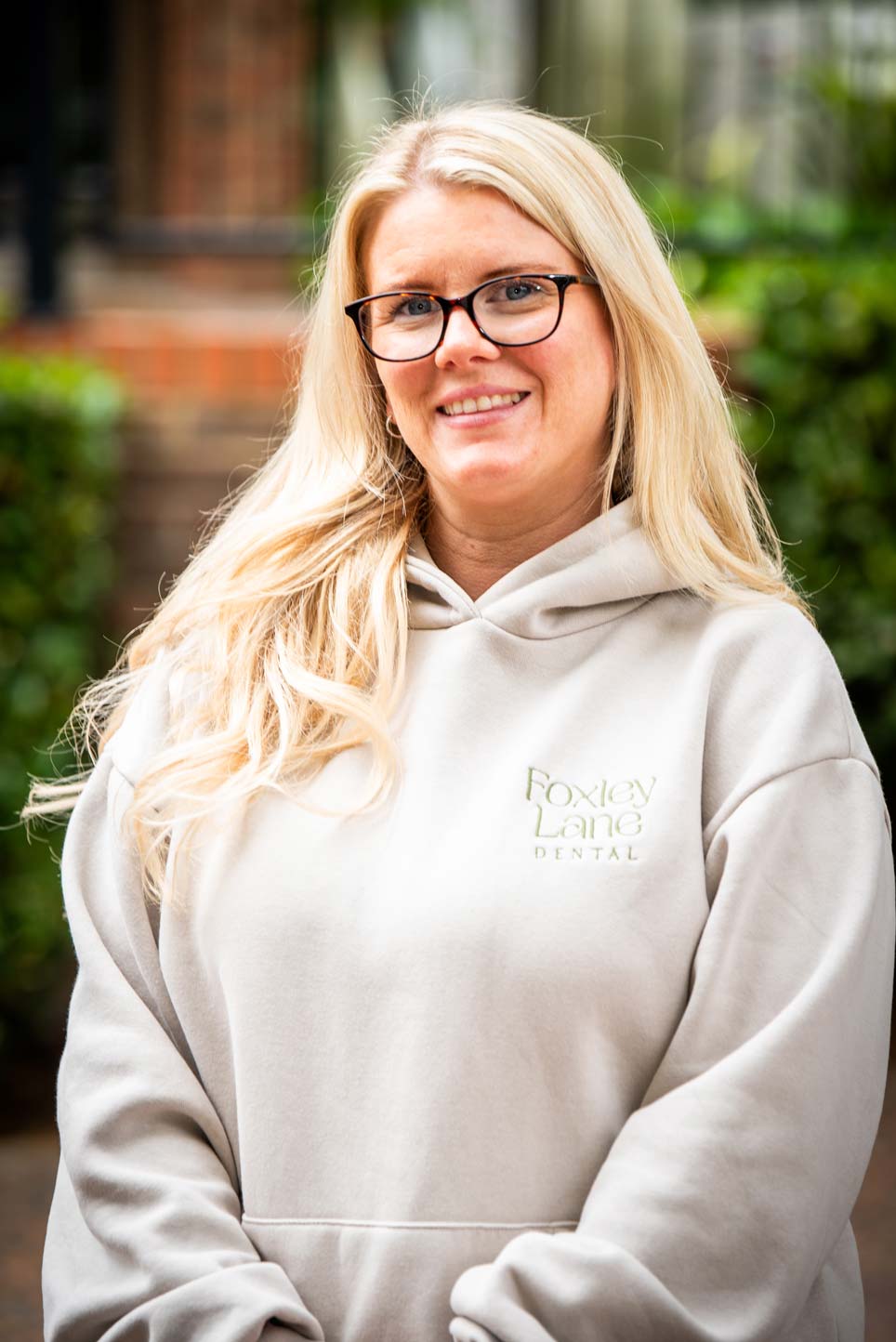 Kayleigh Glading, front of house team member at Foxley Lane Dental, welcoming patients for emergency dental appointments