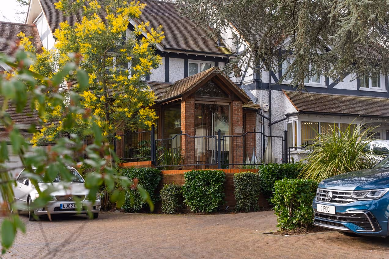 Exterior of Foxley Lane Dental practice surrounded by greenery