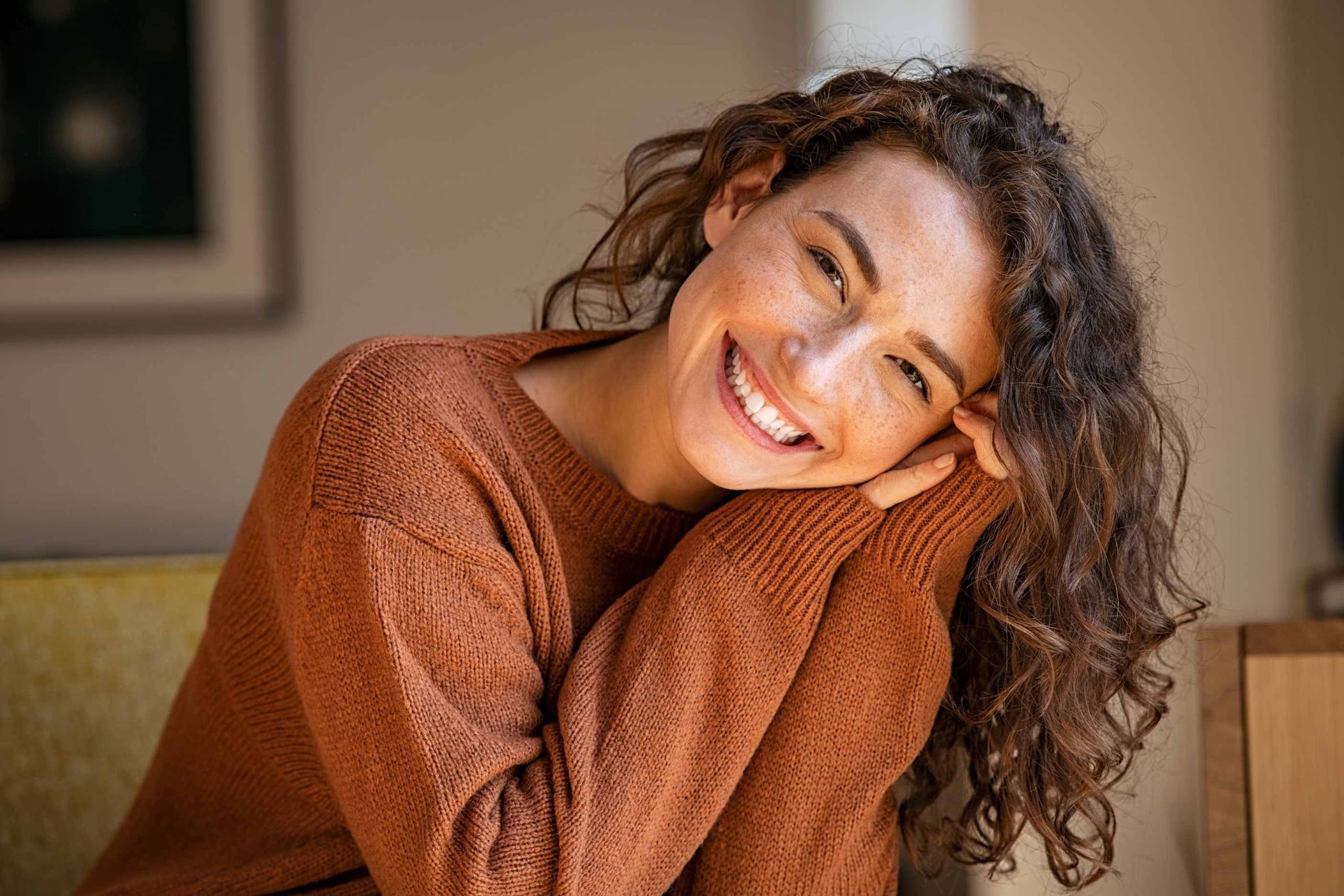 Patient showing natural-looking smile after composite bonding treatment in Purley