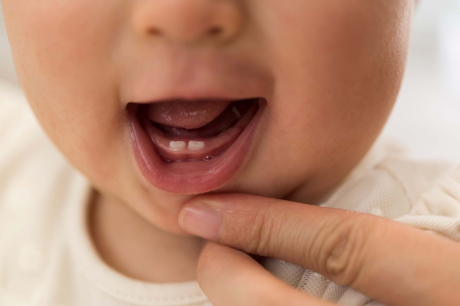 Close-up of a child’s first tooth developing, highlighting early dental care for children in Purley
