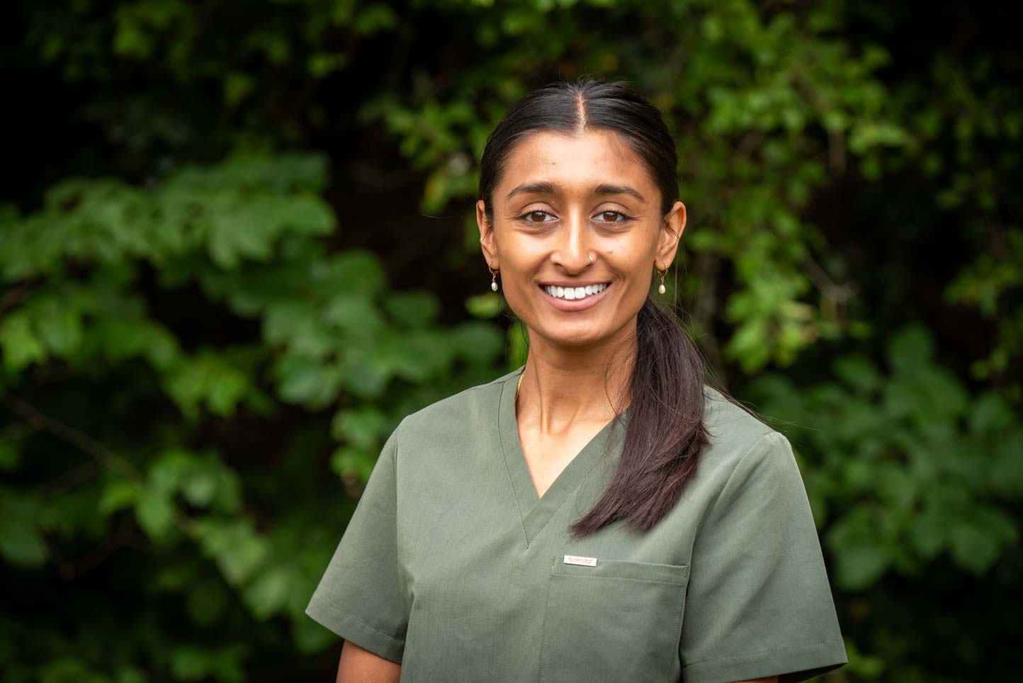 Principal dentist Punita Shah smiling outside Foxley Lane Dental, welcoming patients for routine dental care.