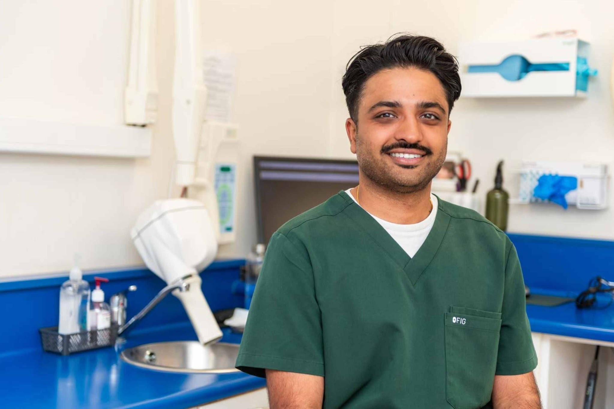 Cosmetic dentist Dr Ankit Patel providing composite bonding treatment in Purley