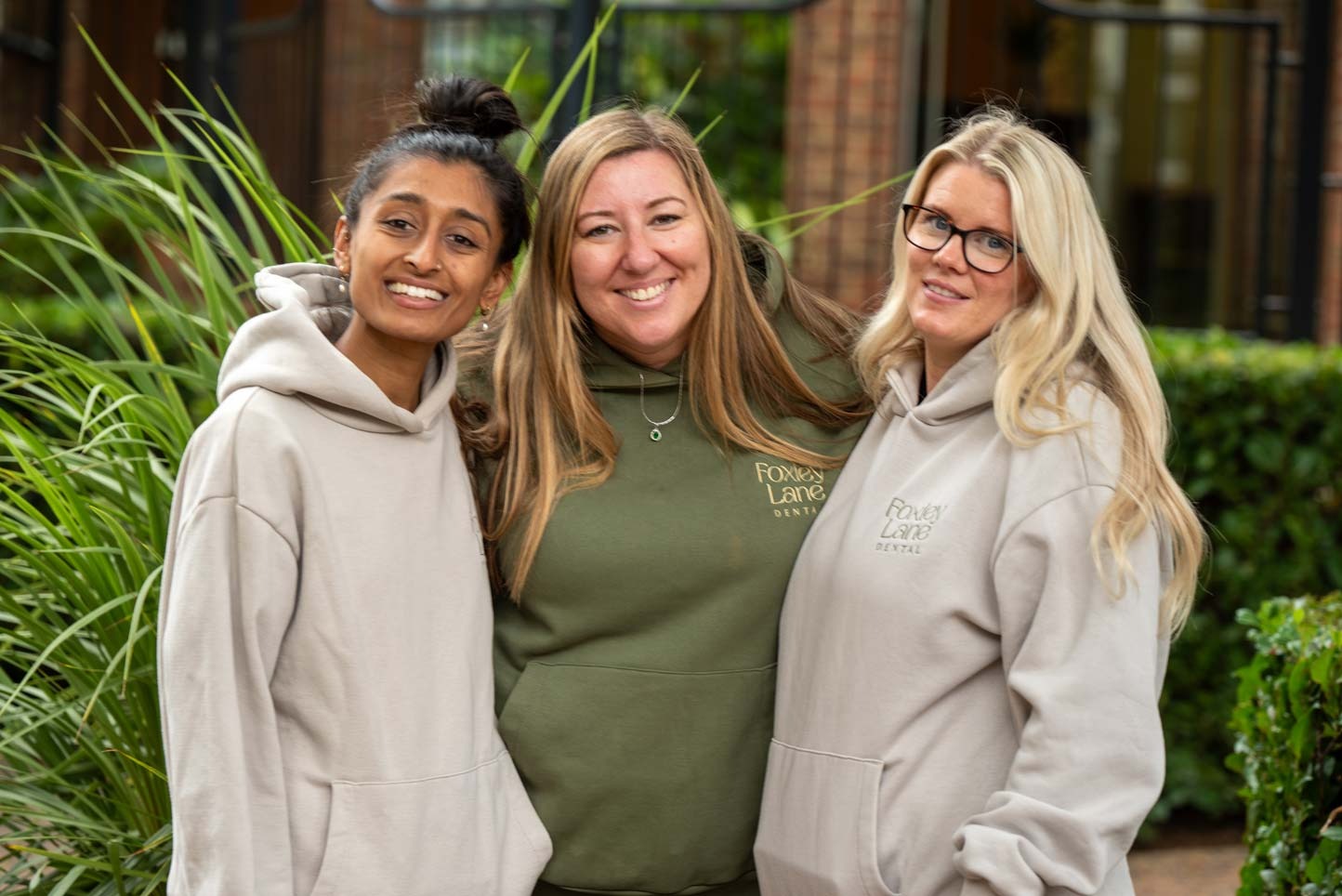 Smiling Foxley Lane Dental staff providing patient-focused care in Purley